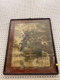 EARLY STYLE BLACK WOODEN FRAMED PRINT OF A JAPANESE STYLE HORSE AND MAN APPROXIMATELY 22 in x 28 in