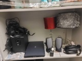 SHELF LOT OF ASSORTED ITEMS. INCLUDES: 2 SMALL TABLE LAMPS, 2 DELL COMPUTER SPEAKERS, 3 LAPTOP