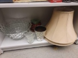 SHELF LOT OF ASSORTED ITEMS TO INCLUDE: 2 LIGHT TAN BELL SHAPED LAMP SHADES, GREEN GLASS CITRONELLA