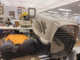 SHELF LOT OF ASSORTED ITEMS TO INCLUDE: A SMALL PLASTIC DOG/CAT CARRIER, A VIRGINIA DEPT OF