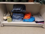 SHELF LOT TO INCLUDE 8 PAIR OF WOMENS JEANS, SWIMSUIT SET, SWIM TRUNKS, TANK TOPS, SOAP DISHES &
