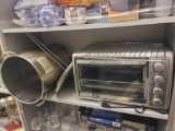 SHELF LOT OF ASSORTED ITEMS. INCLUDES A LIGHT GREY AND CREAM RUNNER, A BLACK & DECKER STAINLESS