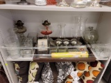 SHELF LOT TO INCLUDE DECORATIVE 2-HANDLED WOOD TRAY, 2 VINTAGE GLASS OIL LAMPS, SQUARE VOTIVE