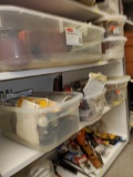 SHELF LOT OF MISC ITEMS, CLEAR CONTAINER FILLED WITH STAPLES AND STAPLE GUN, CLEAR CONTAINER FILLED