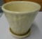 WHITE PLANTER WITH BOW ALL ITEMS ARE SOLD AS IS, WHERE IS, WITH NO GUARANTEE OR WARRANTY. NO REFUNDS