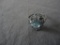 STERLING RING WITH LIGHT BLUE STONES ALL ITEMS ARE SOLD AS IS, WHERE IS, WITH NO GUARANTEE OR