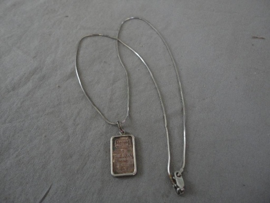 STERLING SILVER CREDIT SUISSE PENDANT ON STERLING SILVER CHAIN ALL ITEMS ARE SOLD AS IS, WHERE IS,
