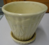 WHITE PLANTER WITH BOW ALL ITEMS ARE SOLD AS IS, WHERE IS, WITH NO GUARANTEE OR WARRANTY. NO REFUNDS
