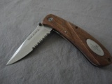 WINCHESTER WOODEN-HANDLED POCKET KNIFE ALL ITEMS ARE SOLD AS IS, WHERE IS, WITH NO GUARANTEE OR