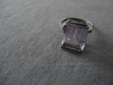 STERLING SILVER RING WITH PURPLE STONE ALL ITEMS ARE SOLD AS IS, WHERE IS, WITH NO GUARANTEE OR