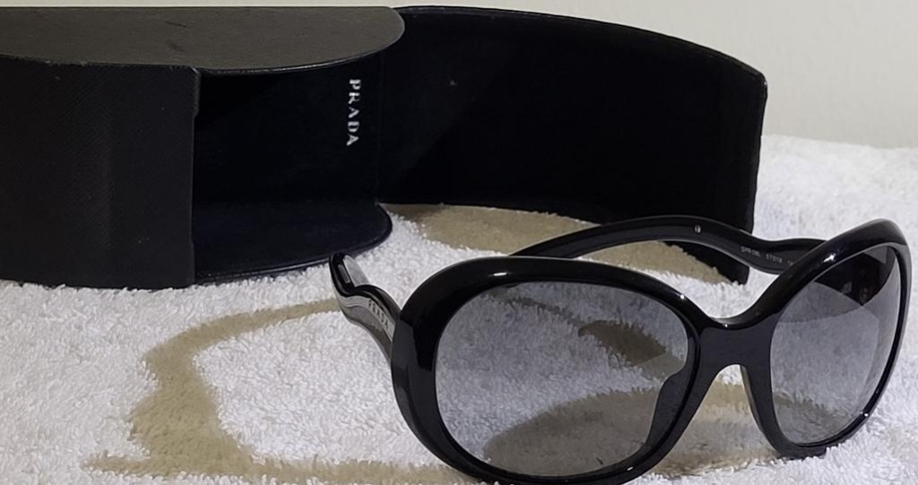 PRADA ICONIC SPR 08L SUNGLASSES WITH CASE. IS SOLD AS IS WHERE IS WITH NO  GUARANTEES OR WARRANTY, NO | Estate & Personal Property Personal Property |  Online Auctions | Proxibid