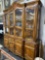 MAHOGANY CHINA CABINET WITH 4 OPENING DOORS ON TOP SECTION AND 4 DRAWERS AND 4 CABINETS ON THE