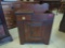 VINTAGE CHILD'S PINE ONE DRAWER ONE DOOR WASH STAND WITH CURVED DETAIL SPLASH BACK. THE CABINET