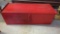 RED SQUARE METAL TOOL BOX EMPTY WITH A FRONT TWIST LOCKING HATCH, MEASURES APPROXIMATELY 30 IN X 13