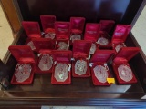 LOT OF (13) WATERFORD CRYSTAL YEARLY ORNAMENTS. EACH WITH DIFFERENT DETAILS. VARIOUS DIFFERENT