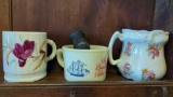 SET OF 3 CUPS, 2 FLORAL MUSTACHE CUPS, 1 IS A LEFT HAND CUP AND THE OTHER IS RIGHT HANDED, AND A OLD