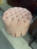 PINKISH OTTOMAN ON WHEELS; MEASURES 27 x 18