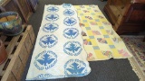 LOT OF 2 QUILTS ONE IS LIGHT STYLE WHITE WITH BLUE EAGLES ON IT, AND THE OTHER IS LIGHT STYLE SQUARE