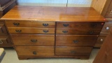 CHERRY WOODEN 6 DRAWER DRESSER MEASURES APPROXIMATELY 51 IN X 19 IN X 32 IN. ALL CONTENTS INSIDE THE