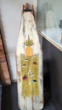 EARLY STYLE WOODEN IRONING BOARD DECORATION, ITEM HAS A PINEAPPLE AND HILLSIDE SCENE PAINTED ON THE