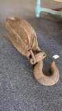 ALL STEEL PULLEY WITH HOOK, IN WORN WORKING ORDER, SIGNIFICANT RUST.