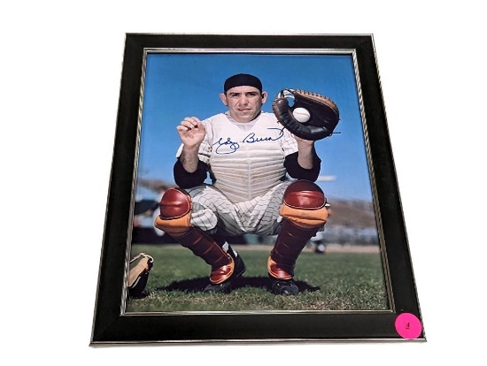 FRAMED & AUTOGRAPHED PHOTO OF YOGI BERRA. DISPLAYED IN A BLACK AND SILVER FRAME. IT MEASURES APPROX.
