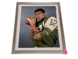 FRAMED & AUTOGRAPHED PHOTO OF JOE NAMATH. DISPLAYED IN A SILVER FRAME. IT MEASURES APPROX. 9-1/2