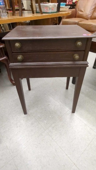 EARLY STYLE WOODEN BED SIDE TABLE WITH TWO DRAWERS, MEASURES APPROXIMATELY 20 IN X15 IN X 28 IN.