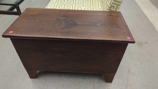 SMALL WOODEN TRUNK WITH A BUILT IN SHELF, MEASURES APPROXIMATELY 30 IN X 14 IN X 20 IN. TRUNK HAS