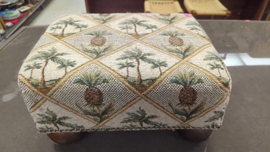 PINEAPPLE FOOT STOOL OTTOMAN FEATURES TAPESTRY FABRIC WITH PINEAPPLE AND PALM TREES DESIGN, MEASURES