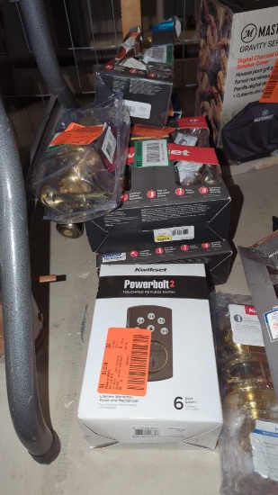 SET OF MISC DOOR KNOBS AND KEYLESS ENTRY DOOR LOCKS, SOME BOXES ARE OPEN, SOME PARTS MAY BE MISSING.