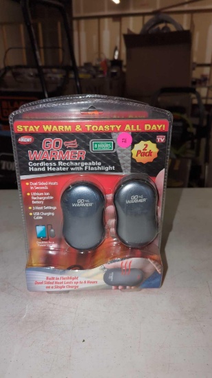 PAIR OF GO WARMER CORDLESS RECHARGEABLE HAND HEATERS WITH FLASHLIGHT STILL IN THE ORIGINAL
