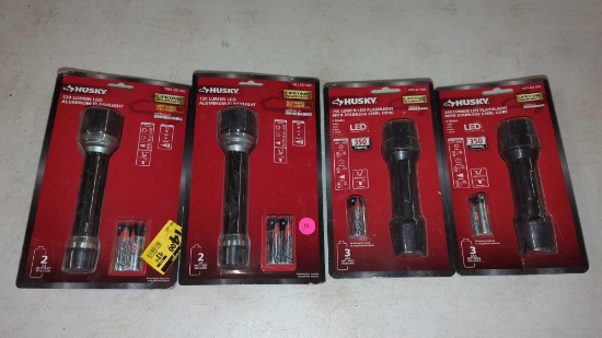 LOT OF 4 HUSKEY HANDHELD LED FLASHLIGHTS WITH BATTERIES