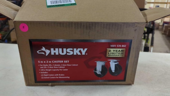 HUSKY 5 IN X 2 IN CASTER SET IN ORIGINAL BOX. RETAIL PRICE VALUE $55.00