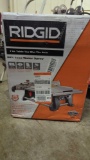 RIDGID 7 INCH TABLE TOP WET TILE SAW, 120V AC, 6.5 AMPS IN THE ORIGINAL BOX RETAIL PRICE VALUE
