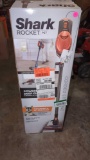 SHARK ROCKET PET CORDED STICK VAC, IN THE ORIGINAL BOX HAS BEEN USED, RETAIL PRICE VALUE $150.00