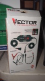 VECTOR BATTERY CHARGER AND MAINTAINER, IN THE ORIGINAL BOX.