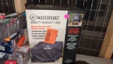 MASTERBUILT GRAVITY SERIES 1050 DIGITAL CHARCOAL SMOKER COVER, IN THE ORIGINAL BOX, RESEALED.