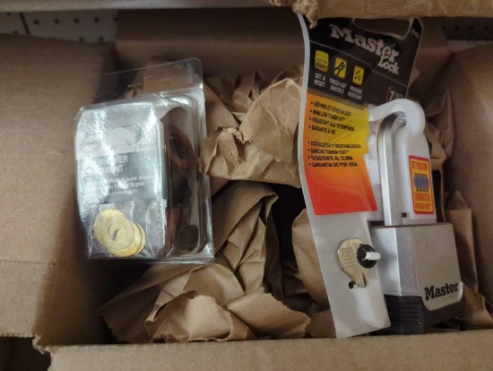 2 item box lot containing a Danco home washer assortment with 42 PCs and a Master Lock 7 security