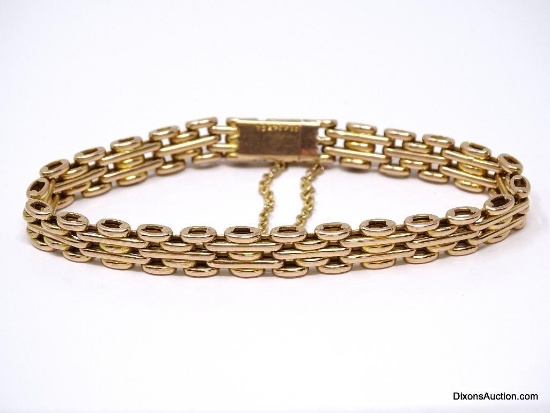 UNIQUE 15K YELLOW GOLD PANTHER LINK BRACELET WITH SAFETY CHAIN. MARKED "RO424364" & "15". IT WEIGHS