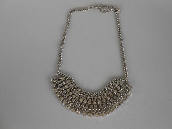 COSTUME NECKLACE SILVERTONE WITHE CLEAR STONES ALL ITEMS ARE SOLD AS IS, WHERE IS, WITH NO GUARANTEE