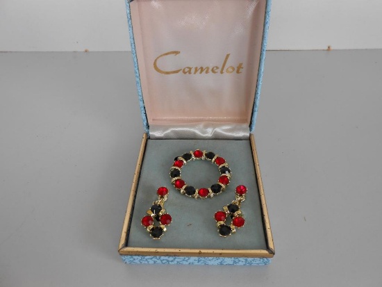 COSTUME CAMELOT BROOCH AND EARRINGS SET WITH MUTT-COLORED STONES ALL ITEMS ARE SOLD AS IS, WHERE IS,