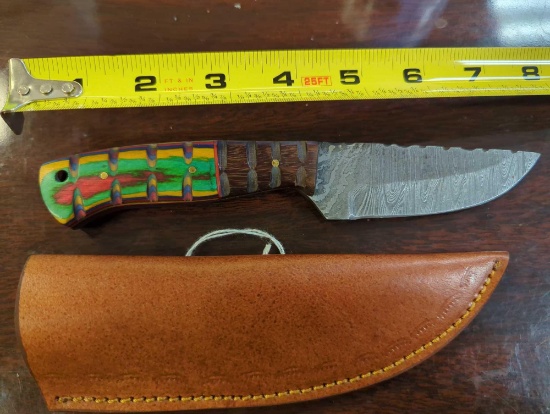 HANDMADE DAMASCUS STRAIGHT BACK KNIFE WITH MULTI COLORED HANDLE. BLADE MEASURES 3.75". COMES WITH