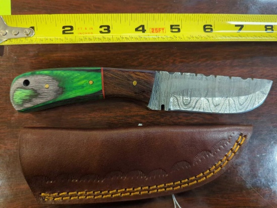 HANDMADE DAMASCUS STRAIGHT BACK KNIFE WITH MULTI COLORED HANDLE. BLADE MEASURES 4". COMES WITH