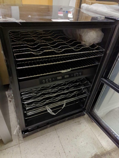 Magic Chef 44 Bottle Dual Zone Wine Cooler in Stainless Steel. Comes as is. Some damage as is shown