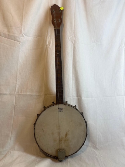 Vintage Wood Handle Banjo. Good condition.