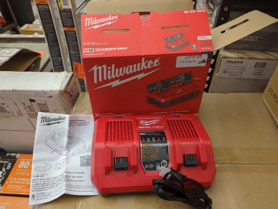 Milwaukee M18 18-Volt Lithium-Ion Dual Bay Rapid Battery Charger. Comes in opened box as is shown in