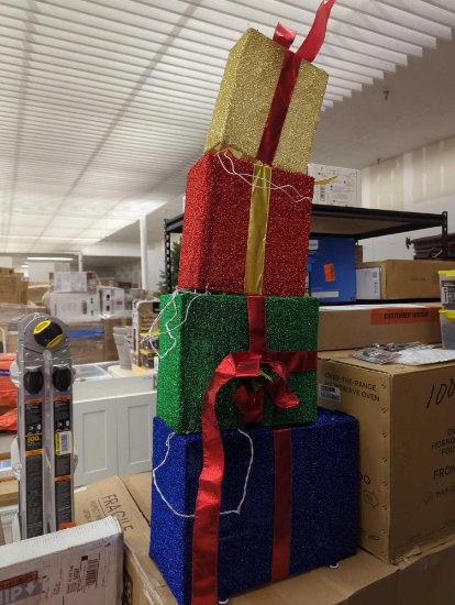 Home Accents Holiday 4.5 ft. Tinsel LED Stacked Gift Boxes Holiday Yard Decoration. Comes in opened
