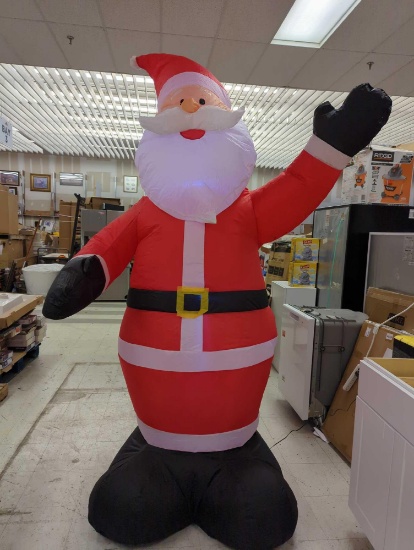 HOME ACCENTS HOLIDAY 9 FT GIANT SIZED SANTA HOLIDAY INFLATABLE, APPEARS TO BE USED IN OPEN BOX HAS