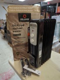 Pelonis 1,500-Watt Oil-Filled Radiant Electric Space Heater with Thermostat. Comes in opened box as